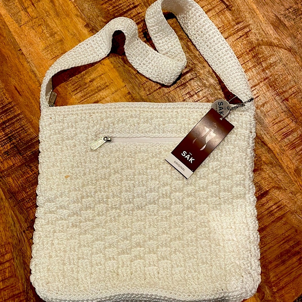 The Sam Naples white tight weave handbag